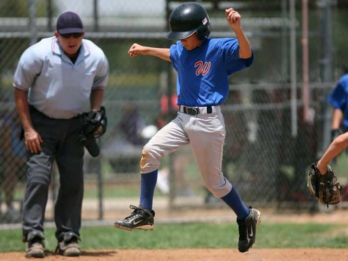 boy playing baseball